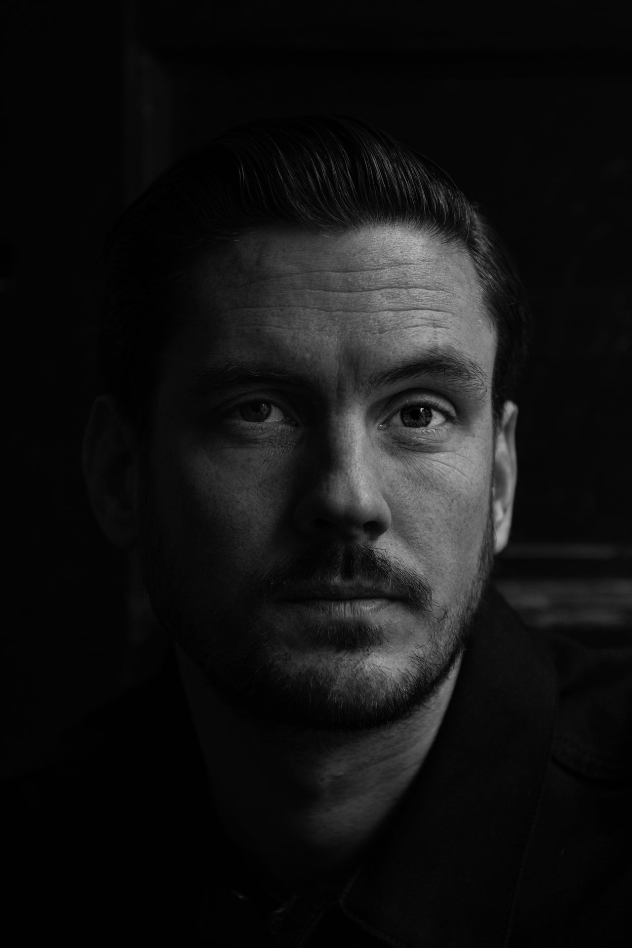 Close-up portrait of Daniel Ankarstrand, founder of sustainable fashion brand Kristian Edde.