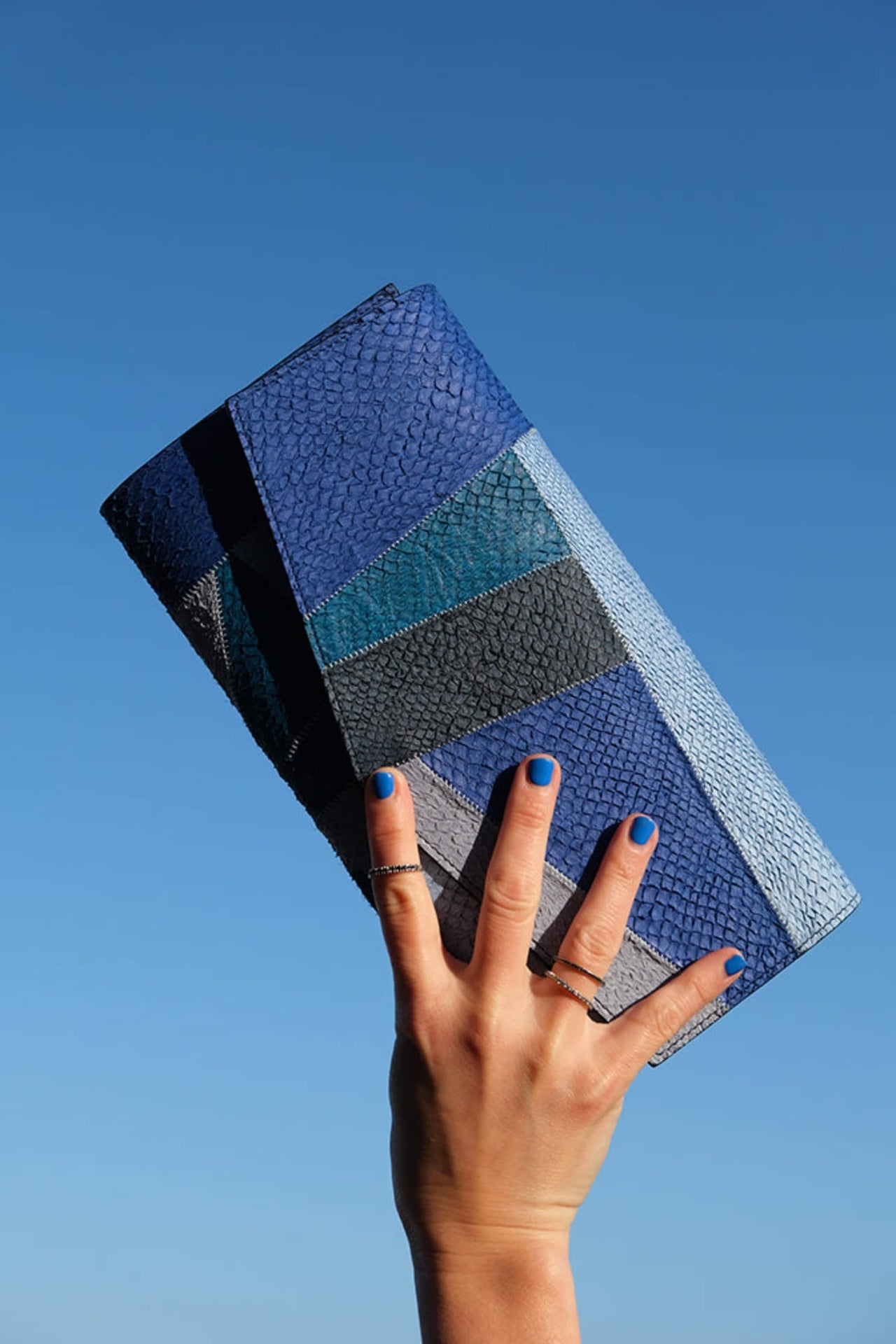 Embla Clutch in textured salmon leather from the California Canvas collection, sustainable luxury by Kristian Eddé
