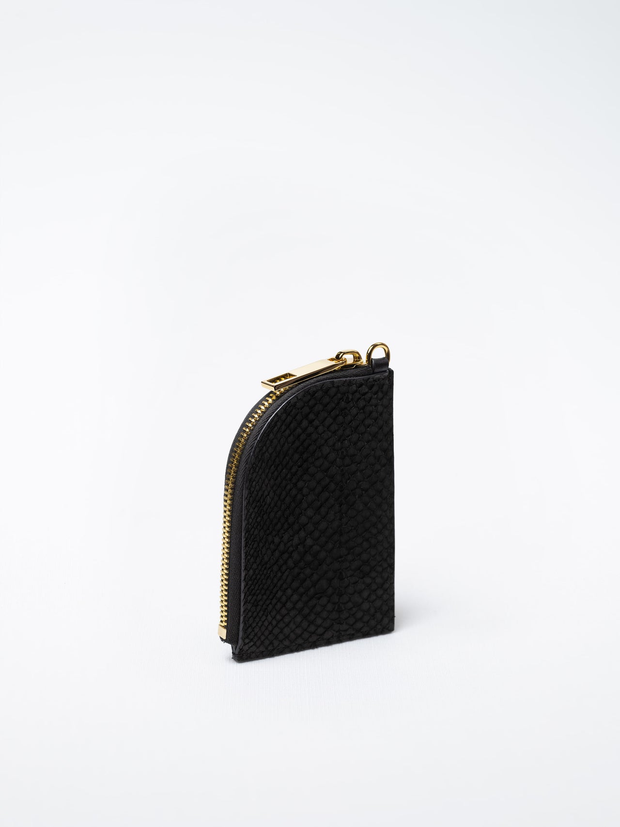 Salma zipper wallet in black salmon leather with gold zipper – handcrafted in Sweden by Kristian Eddé