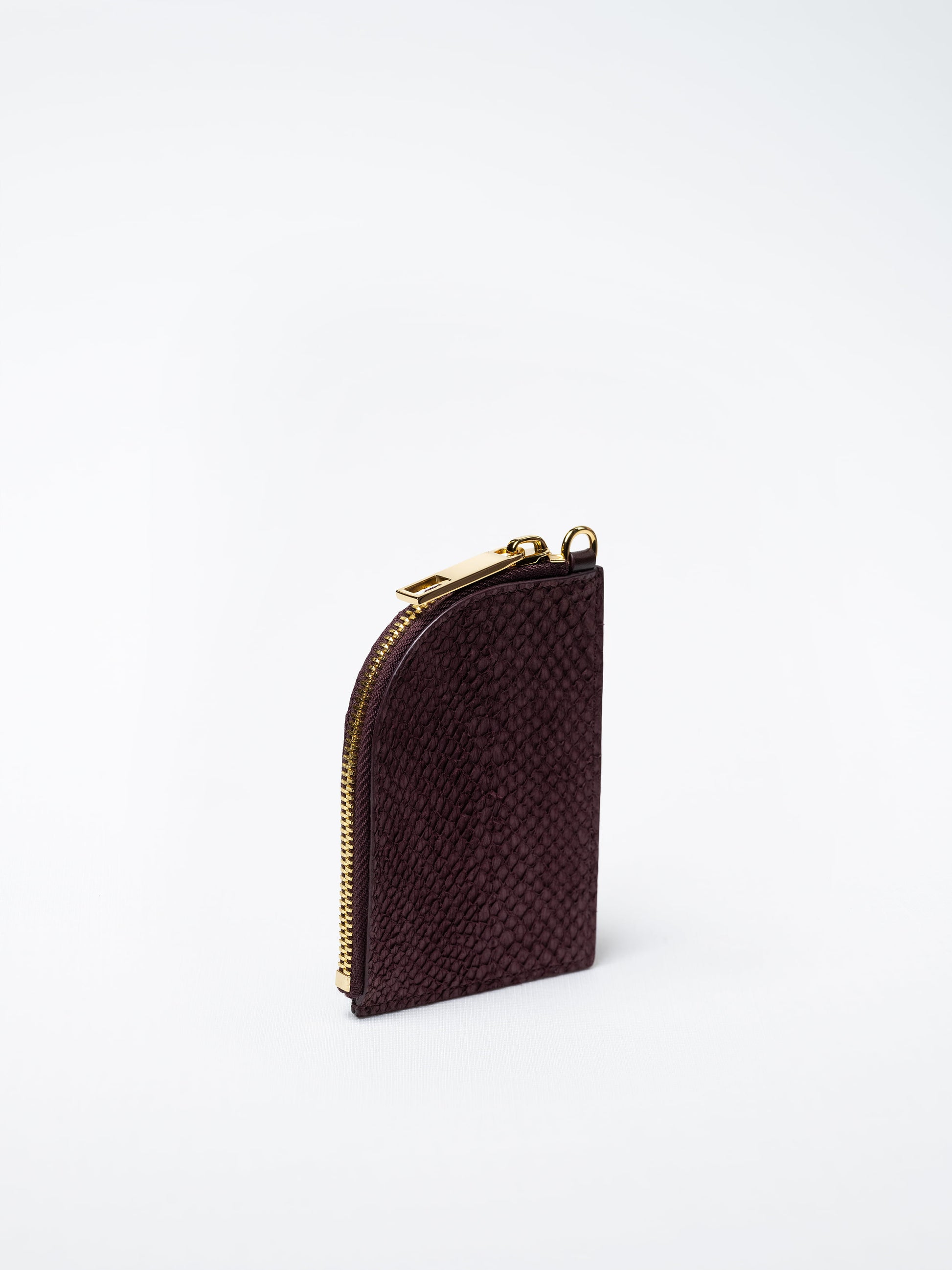 Salma zipper wallet in burgundy salmon leather with gold zipper – handcrafted in Sweden by Kristian Eddé