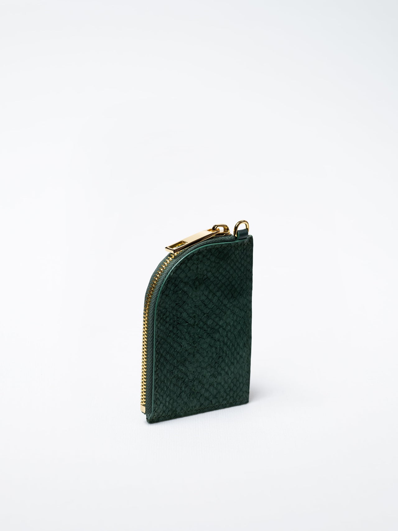 Salma zipper wallet in kelp green salmon leather with gold zipper – handcrafted in Sweden by Kristian Eddé