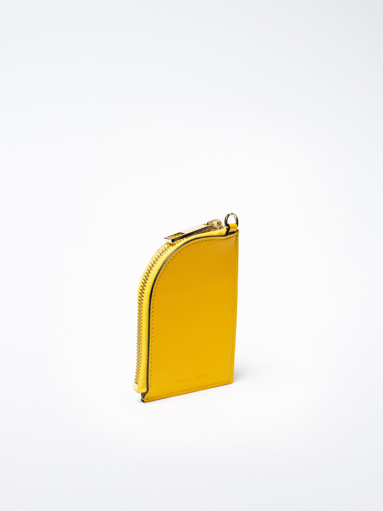 Salma zipper wallet in yellow salmon leather with gold zipper, handcrafted in Sweden by Kristian Eddé
