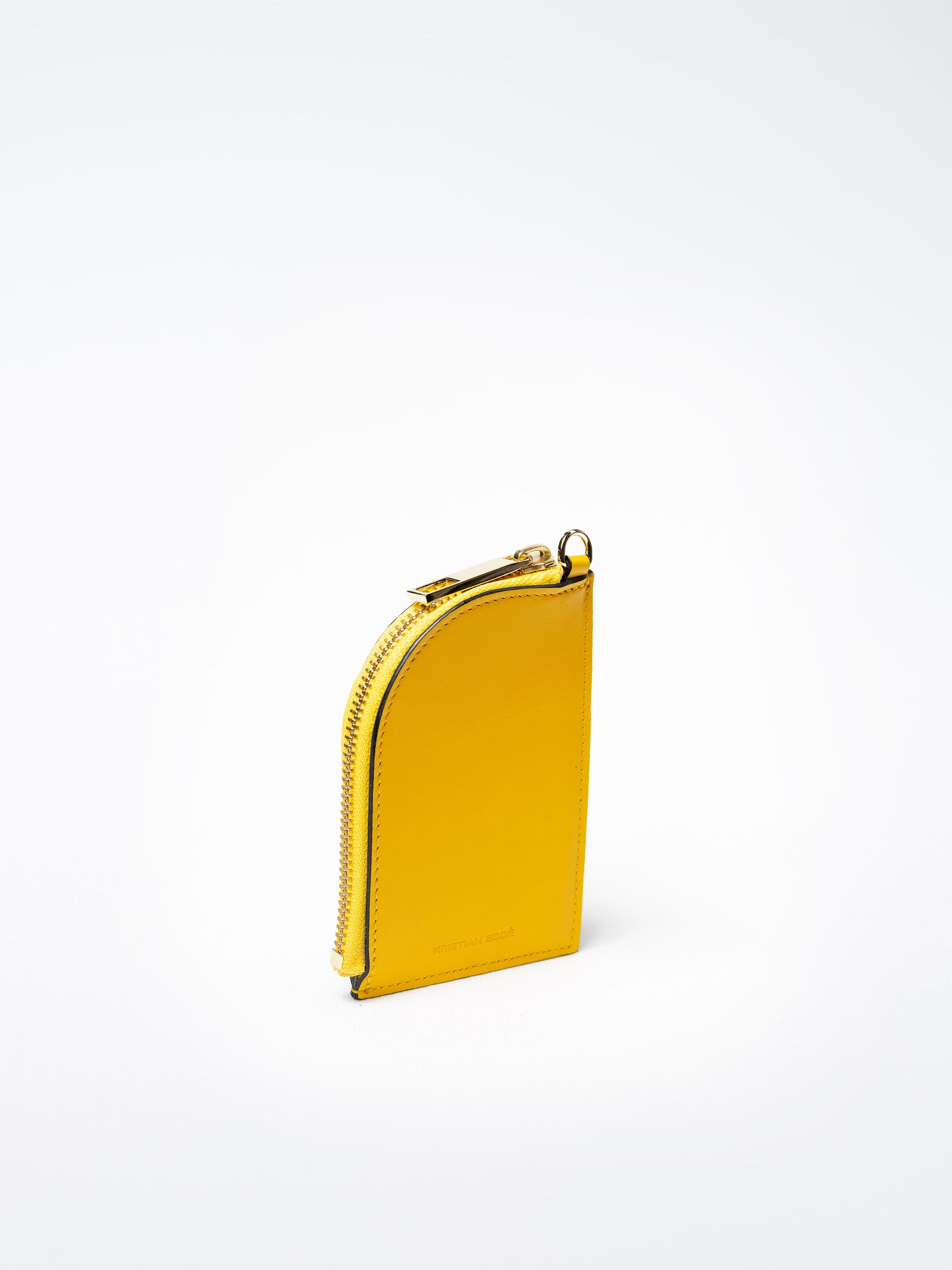 Salma zipper wallet in yellow salmon leather with gold zipper, handcrafted in Sweden by Kristian Eddé