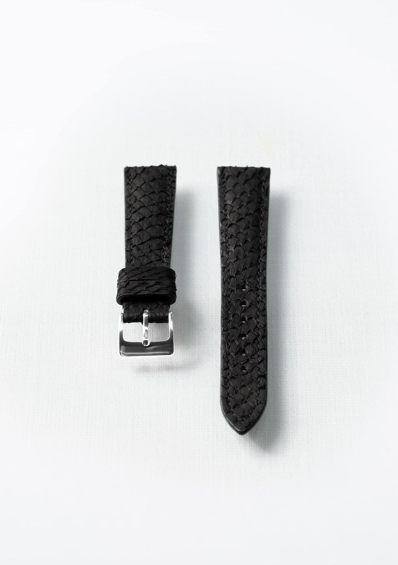 Black salmon leather watch strap with silver buckle, handcrafted sustainable accessory by Kristian Eddé