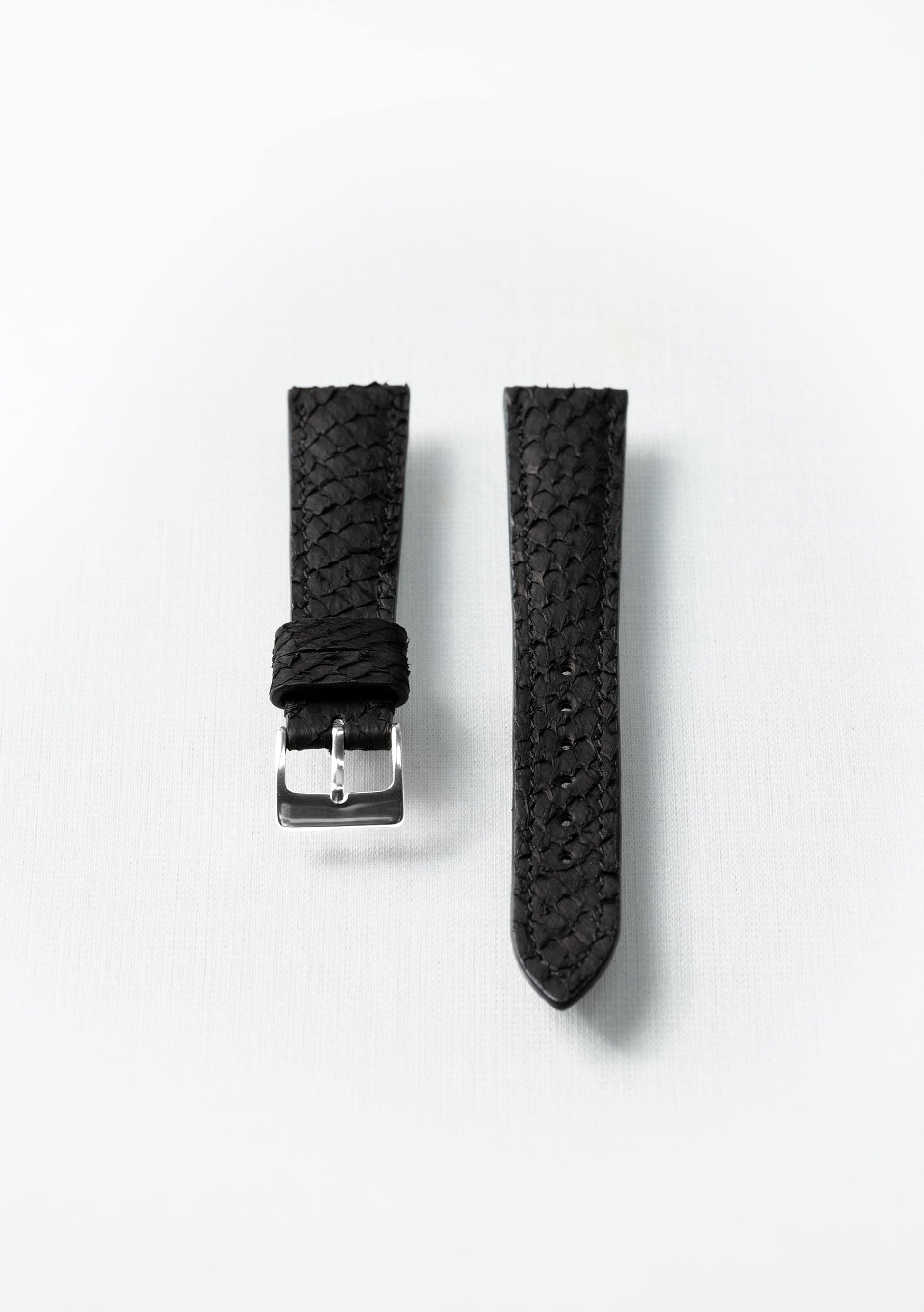 Black salmon leather watch strap with silver buckle, handcrafted sustainable accessory by Kristian Eddé