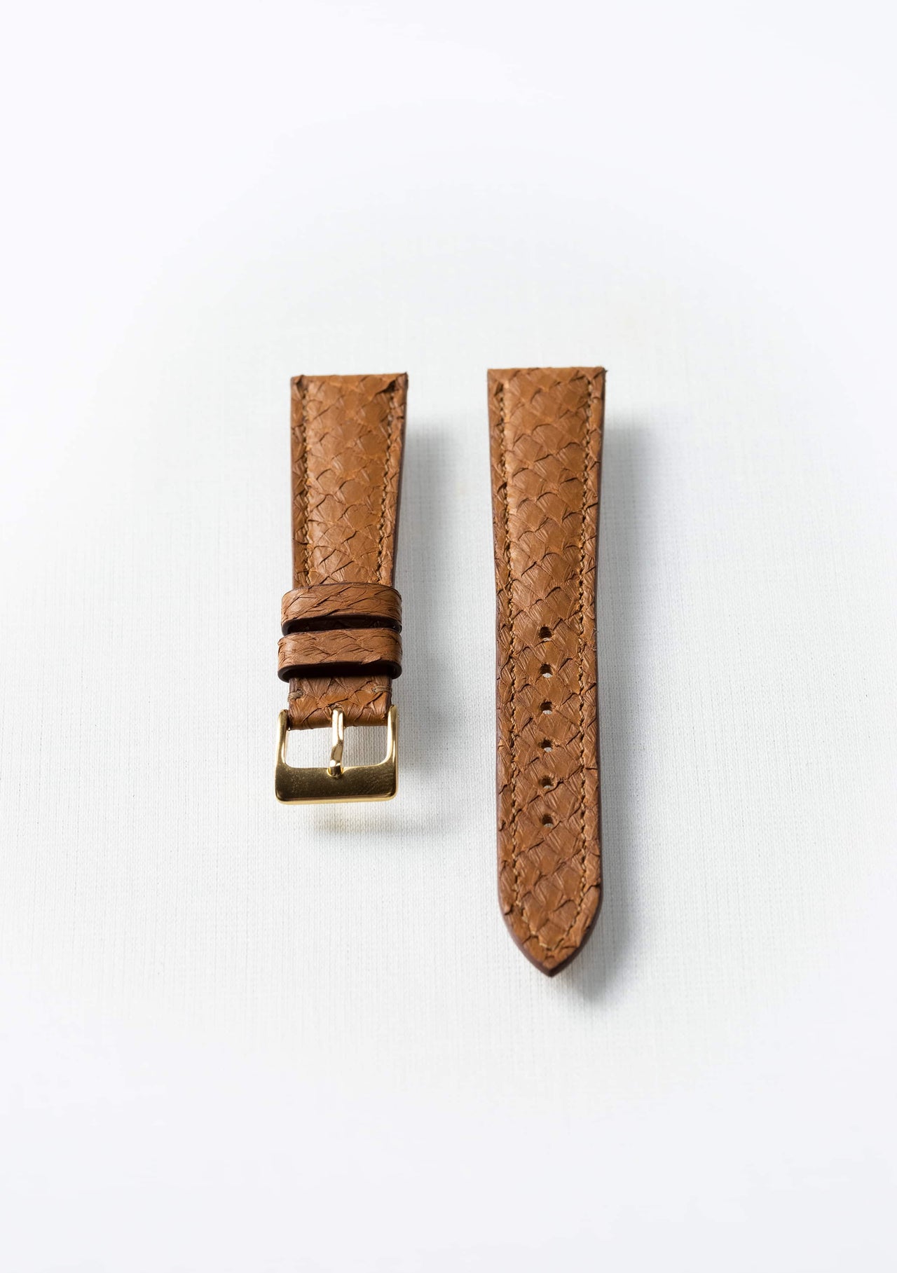 Cognac brown salmon leather watch strap with gold buckle, handcrafted sustainable accessory by Kristian Eddé