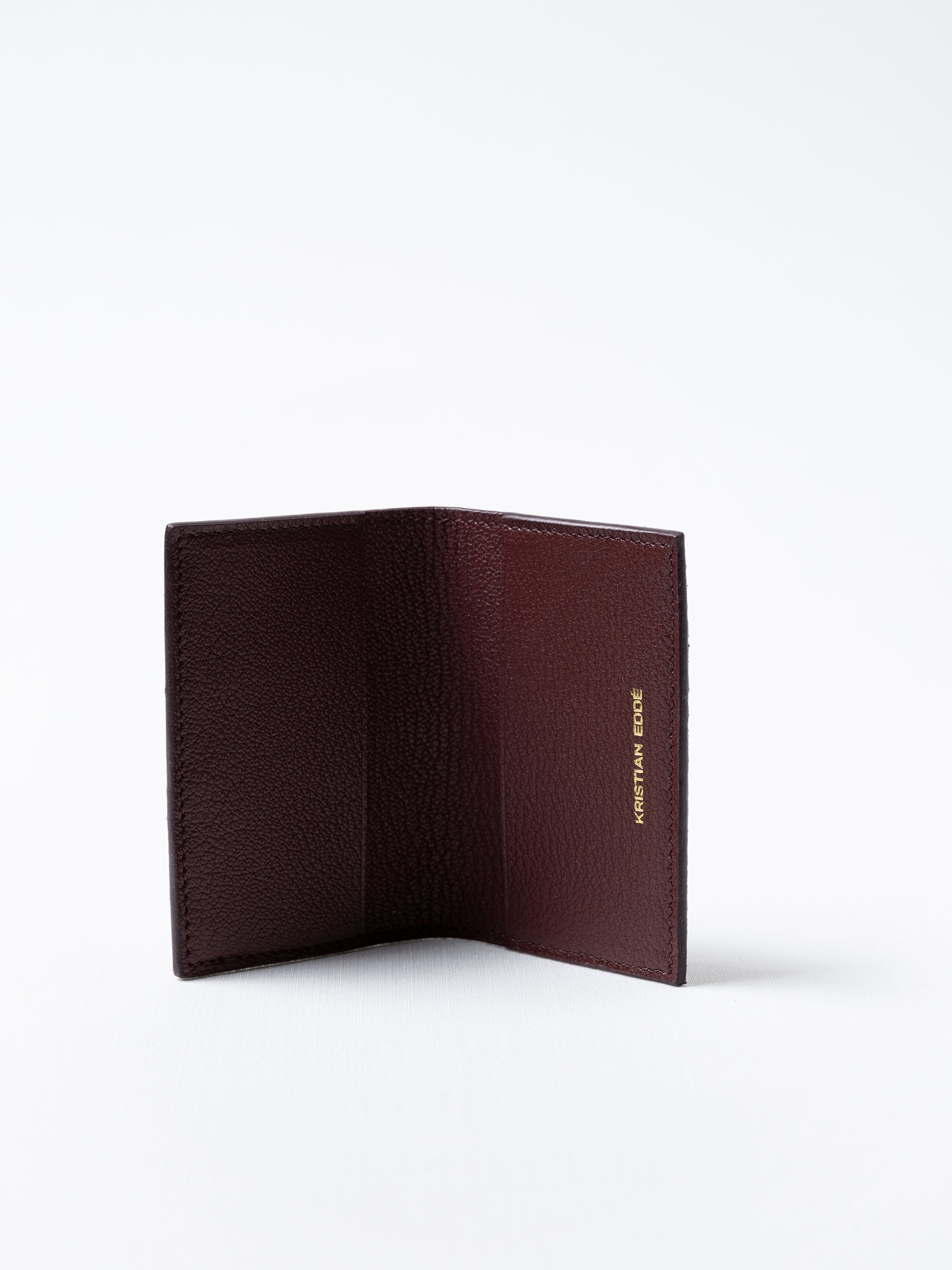 Barents cardholder made of burgundy salmon leather, open view showing card slots