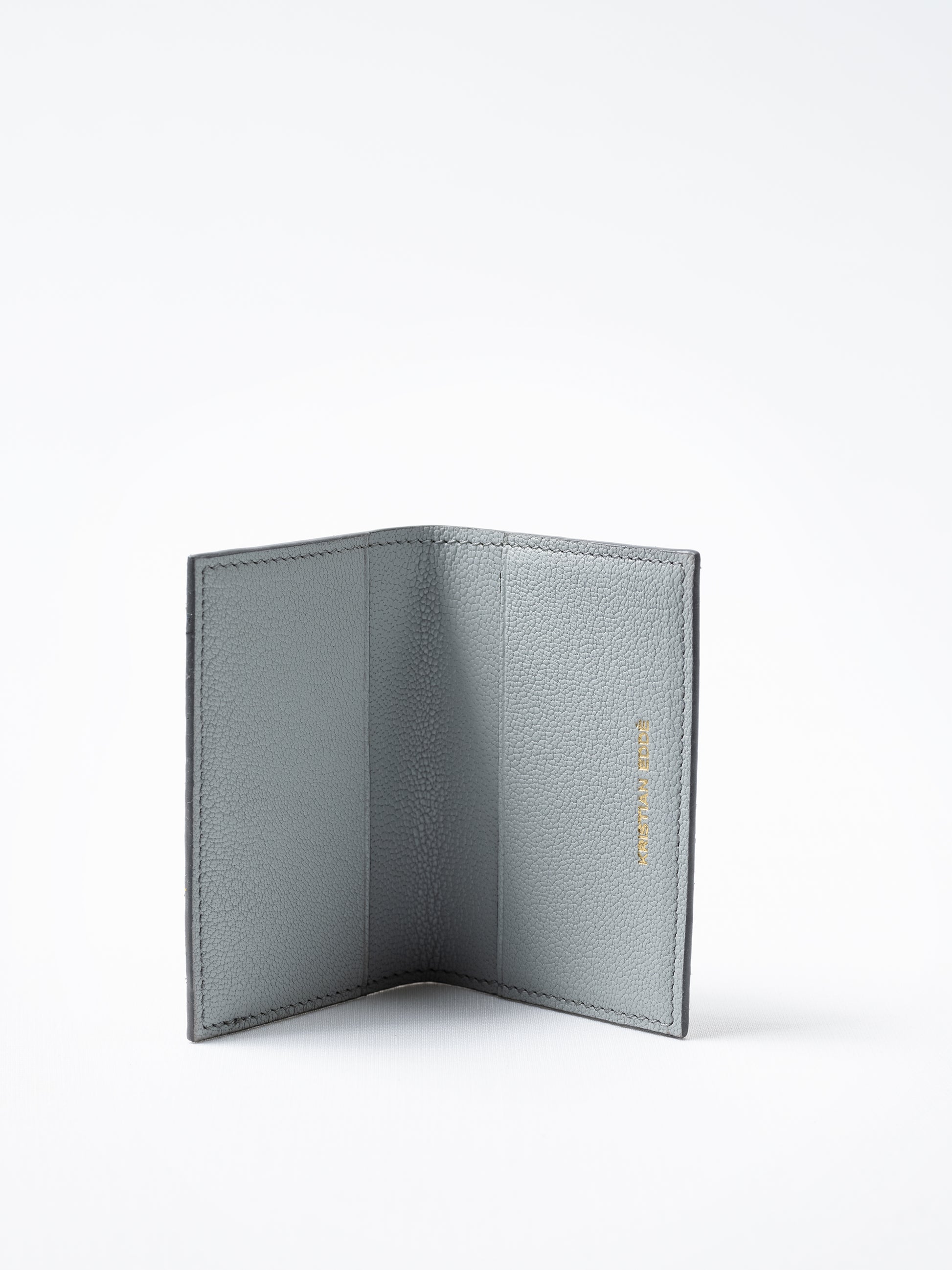 Barents cardholder made of himalayan gray salmon leather, open view showing card slots

