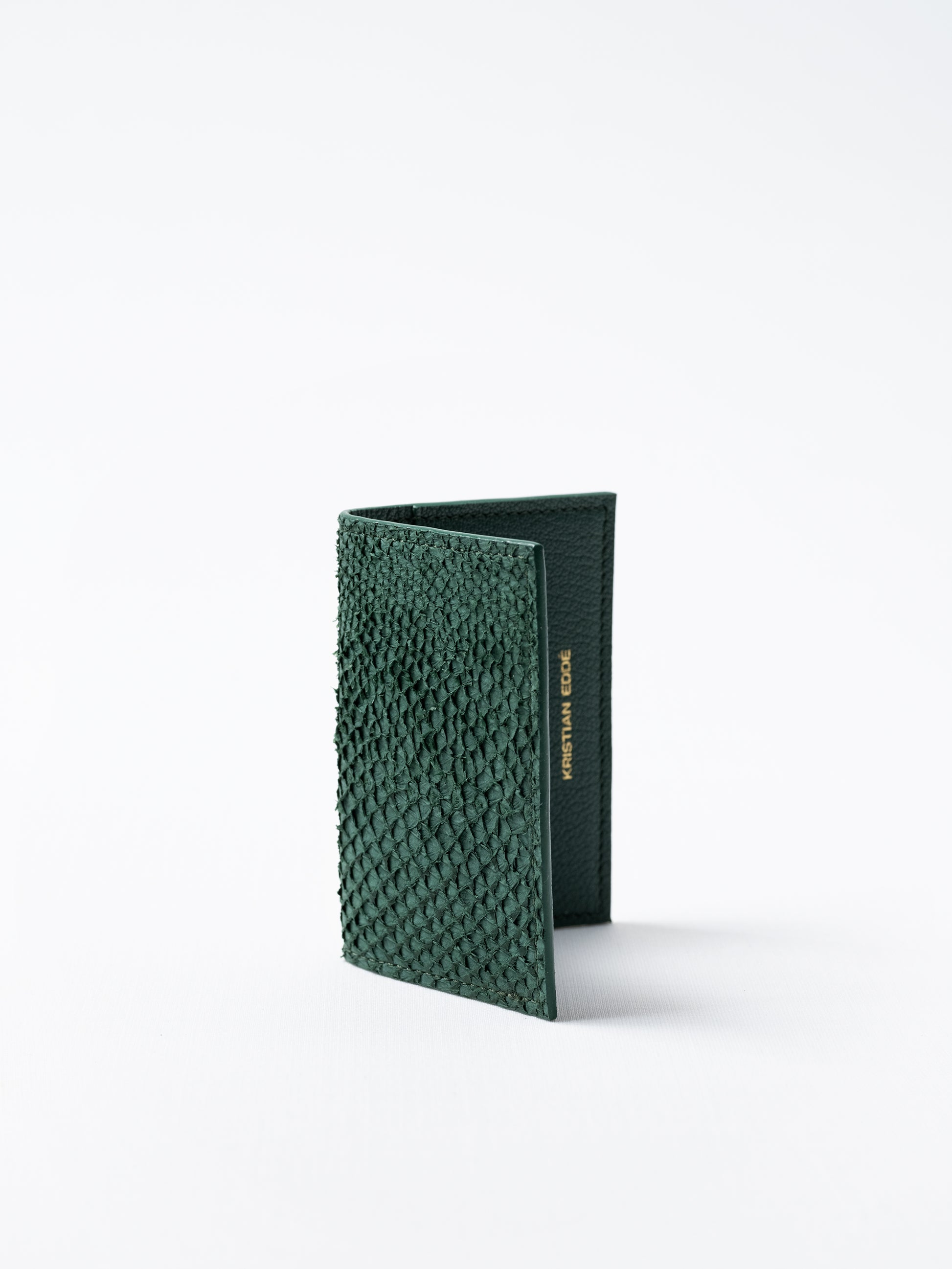 Barents cardholder made of  green salmon leather, photographed on white background
