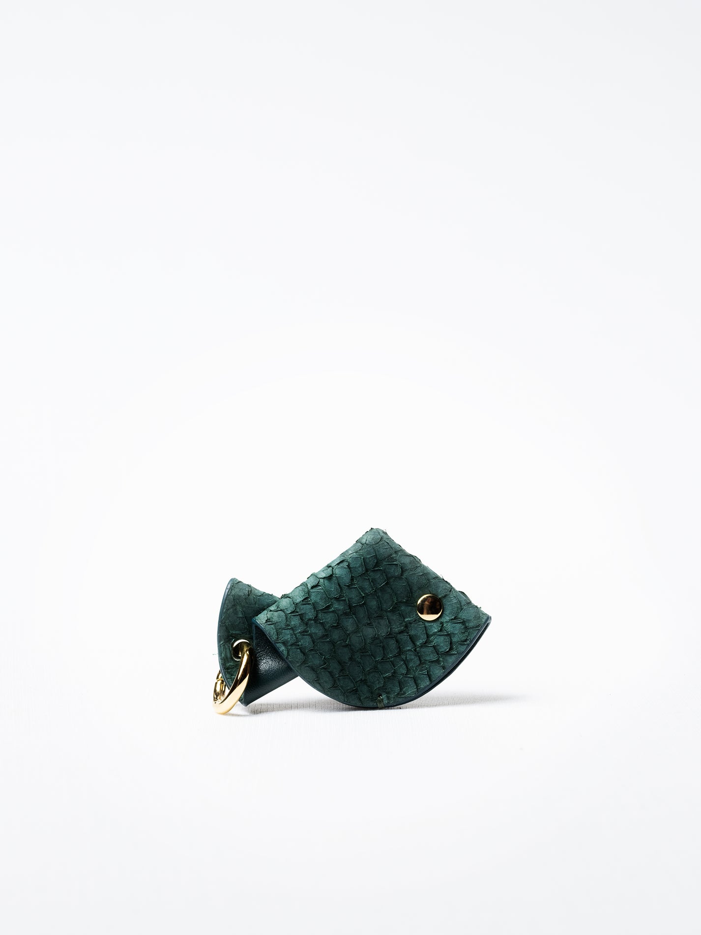 Fish key charm in kelp green salmon leather, shown with gold-plated key ring
